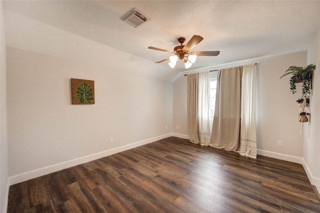 18719 Glenn Haven Estates Dr, Spring, TX 77379 - unfurnished room featuring a ceiling fan, vaulted ceiling, and dark wood-style flooring