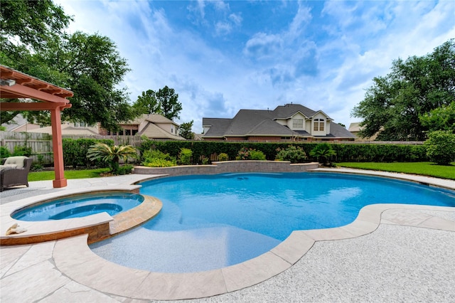 18719 Glenn Haven Estates Dr, Spring, TX 77379 - view of pool with a fenced backyard and a pool with connected hot tub