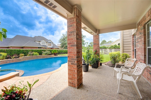 18719 Glenn Haven Estates Dr, Spring, TX 77379 - view of swimming pool with a pool with connected hot tub and a patio area