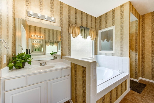 18719 Glenn Haven Estates Dr, Spring, TX 77379 - full bath featuring a garden tub, wallpapered walls, tile patterned flooring, and vanity