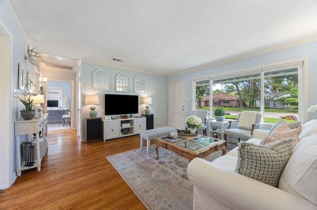 1726 Saxon Dr, Houston, TX 77018 - living area featuring crown molding and light wood-type flooring