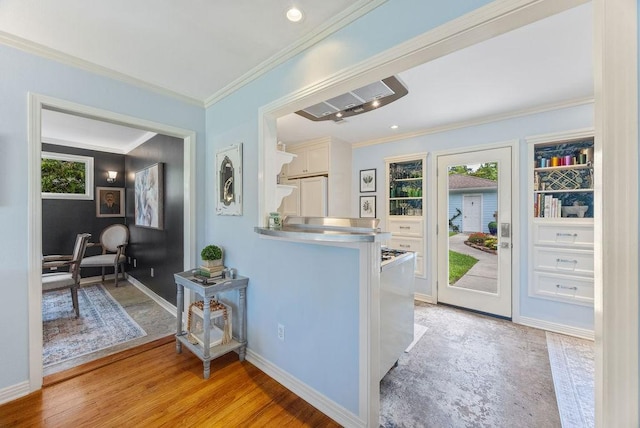 1726 Saxon Dr, Houston, TX 77018 - kitchen with white cabinetry, stainless steel countertops, crown molding, and light wood-style floors