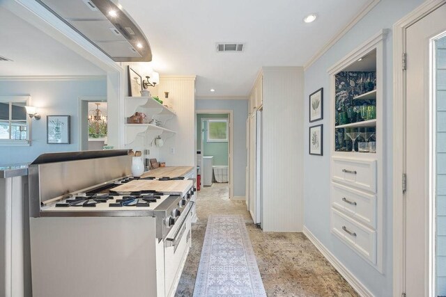 1726 Saxon Dr, Houston, TX 77018 - kitchen featuring open shelves, crown molding, freestanding refrigerator, recessed lighting, and white cabinets
