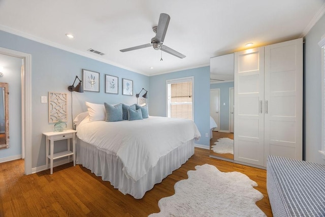 1726 Saxon Dr, Houston, TX 77018 - bedroom featuring ornamental molding, light wood-style flooring, a ceiling fan, and recessed lighting