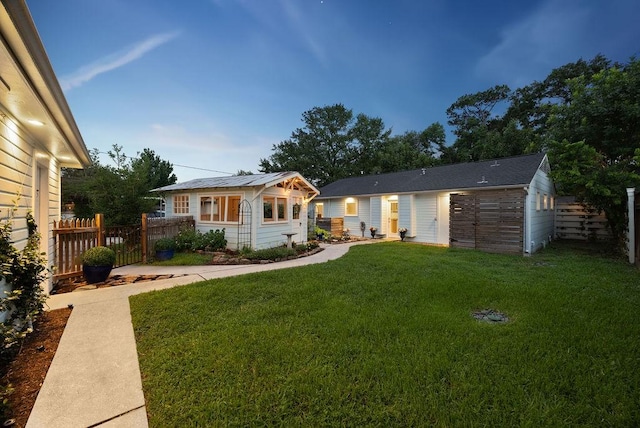 1726 Saxon Dr, Houston, TX 77018 - rear view of house with an outbuilding