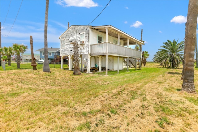 314 Oyster St, Surfside Beach, TX 77541 - back of house featuring stairway and a deck