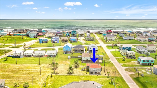 314 Oyster St, Surfside Beach, TX 77541 - aerial perspective of suburban area with a large body of water