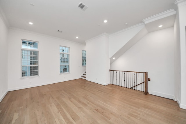 861 Dunleigh Meadows Ln, Houston, TX 77055 - unfurnished room featuring crown molding, light wood-style floors, and recessed lighting