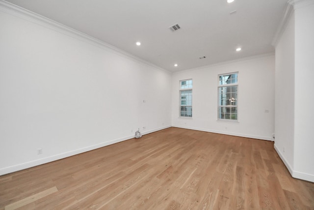 861 Dunleigh Meadows Ln, Houston, TX 77055 - unfurnished room with crown molding, light wood-type flooring, and recessed lighting