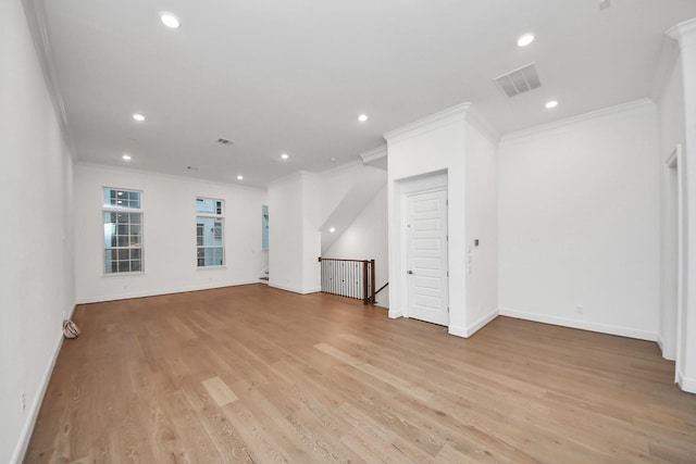 861 Dunleigh Meadows Ln, Houston, TX 77055 - unfurnished room featuring ornamental molding, light wood-type flooring, and recessed lighting