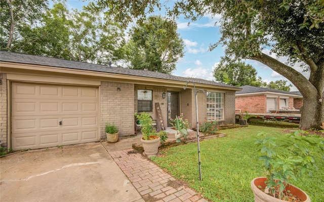 516 W Mimosa St, Angleton, TX 77515 - ranch-style home with brick siding, a front lawn, a garage, and driveway