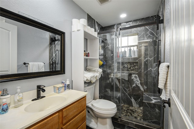 516 W Mimosa St, Angleton, TX 77515 - bathroom featuring a marble finish shower and vanity