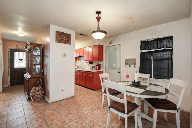 516 W Mimosa St, Angleton, TX 77515 - dining room featuring baseboards and light tile patterned floors