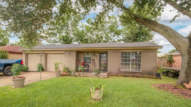 516 W Mimosa St, Angleton, TX 77515 - single story home featuring concrete driveway, brick siding, an attached garage, and a front yard