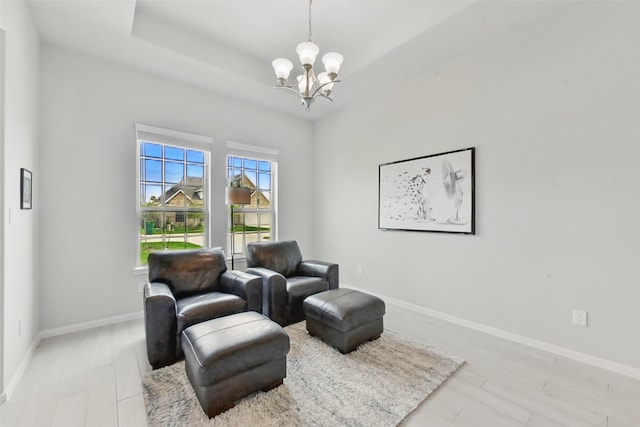 250 Peninsula Point Dr, Montgomery, TX 77356 - sitting room with a chandelier and light wood finished floors