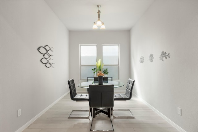 250 Peninsula Point Dr, Montgomery, TX 77356 - dining space with light wood finished floors and baseboards