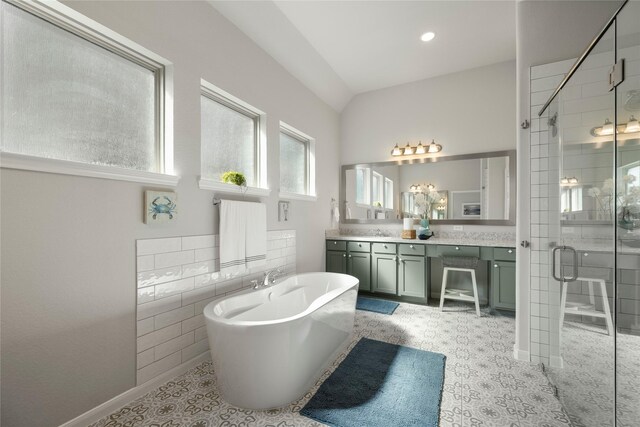 250 Peninsula Point Dr, Montgomery, TX 77356 - bathroom with double vanity, a freestanding bath, a shower stall, and recessed lighting