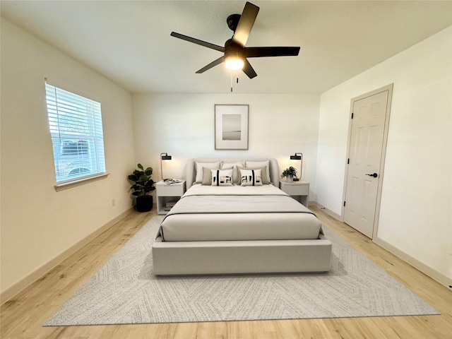 5503 Duxbury St, Houston, TX 77035 - bedroom featuring wood finished floors and a ceiling fan