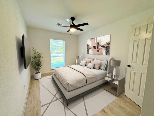 5503 Duxbury St, Houston, TX 77035 - bedroom featuring light wood-type flooring and a ceiling fan