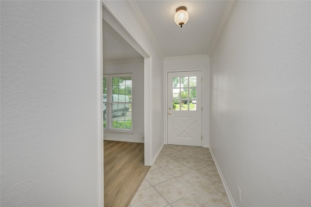 110 Spruce St, Lake Jackson, TX 77566 - doorway to outside with ornamental molding and light tile patterned floors