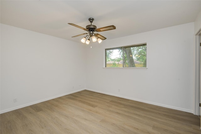 110 Spruce St, Lake Jackson, TX 77566 - unfurnished room featuring light wood-style floors and a ceiling fan