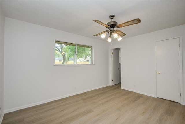 110 Spruce St, Lake Jackson, TX 77566 - unfurnished bedroom featuring light wood-style flooring and ceiling fan
