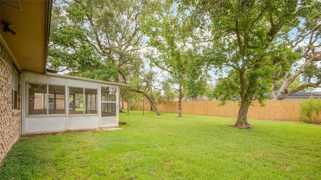 110 Spruce St, Lake Jackson, TX 77566 - fenced backyard featuring a sunroom