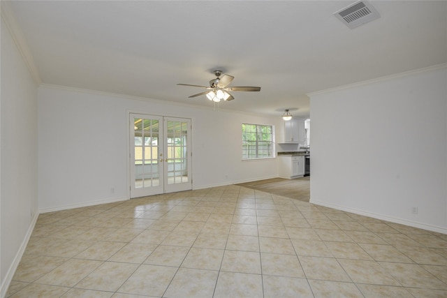 110 Spruce St, Lake Jackson, TX 77566 - spare room with crown molding, a ceiling fan, and light tile patterned flooring