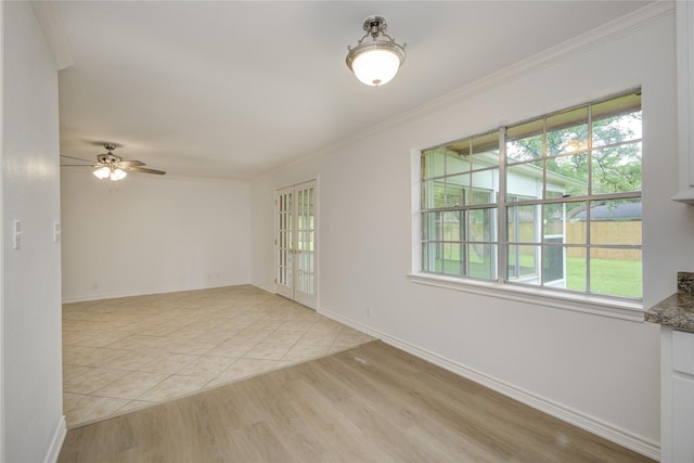 110 Spruce St, Lake Jackson, TX 77566 - spare room featuring ornamental molding, plenty of natural light, light wood finished floors, and ceiling fan