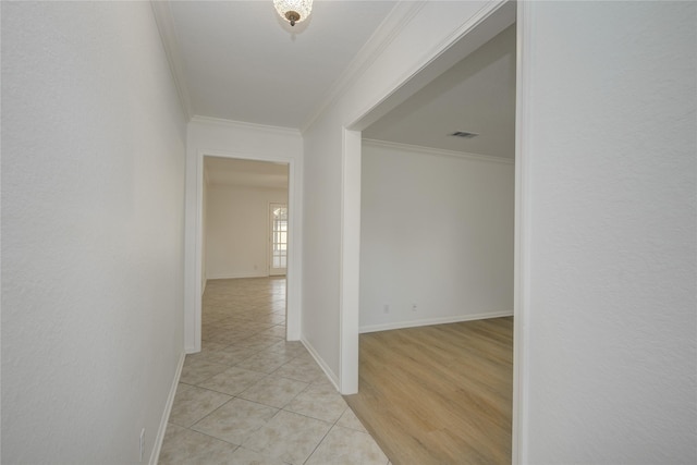 110 Spruce St, Lake Jackson, TX 77566 - hallway featuring crown molding and light tile patterned floors