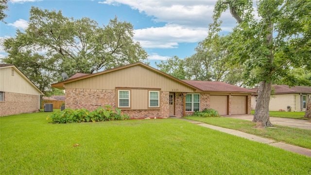 110 Spruce St, Lake Jackson, TX 77566 - ranch-style house featuring a garage, brick siding, concrete driveway, and a front yard