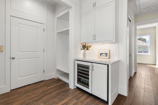 742 Positano Rd, Galveston, TX 77550 - indoor dry bar featuring dark wood finished floors and beverage cooler