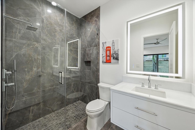 507 W Bell, Houston, TX 77019 - full bathroom with a marble finish shower, vanity, and a ceiling fan