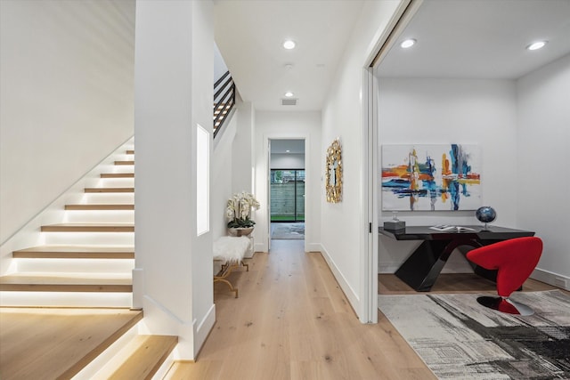 507 W Bell, Houston, TX 77019 - hallway with stairway, wood finished floors, and recessed lighting