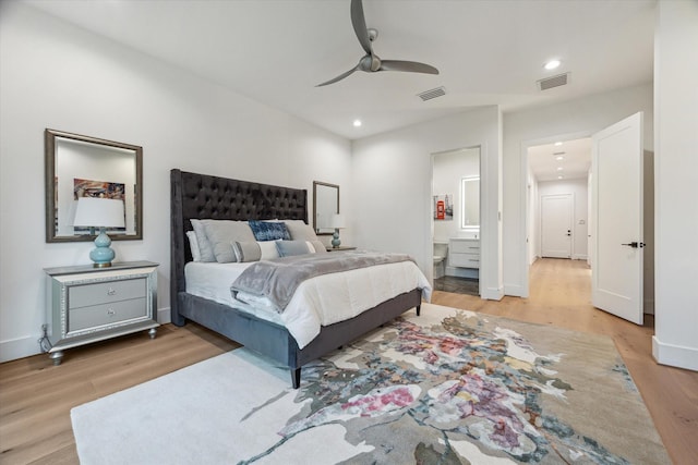 507 W Bell, Houston, TX 77019 - bedroom featuring light wood-style flooring, recessed lighting, ceiling fan, and ensuite bathroom