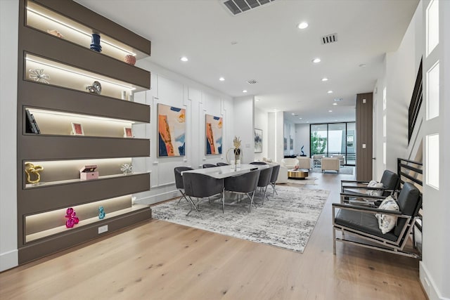 507 W Bell, Houston, TX 77019 - dining space with wood finished floors and recessed lighting