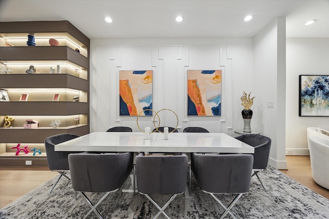 507 W Bell, Houston, TX 77019 - dining room featuring wood finished floors and recessed lighting