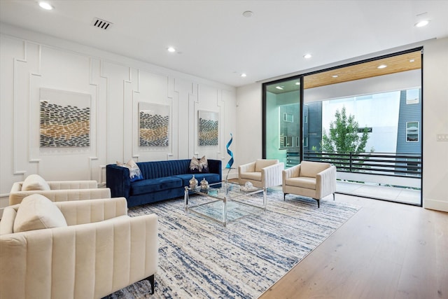 507 W Bell, Houston, TX 77019 - living room with wood finished floors and recessed lighting
