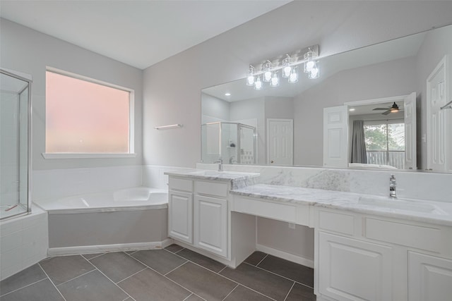 7602 Las Flores Dr, Houston, TX 77083 - full bathroom with a stall shower, a garden tub, double vanity, tile patterned floors, and ceiling fan