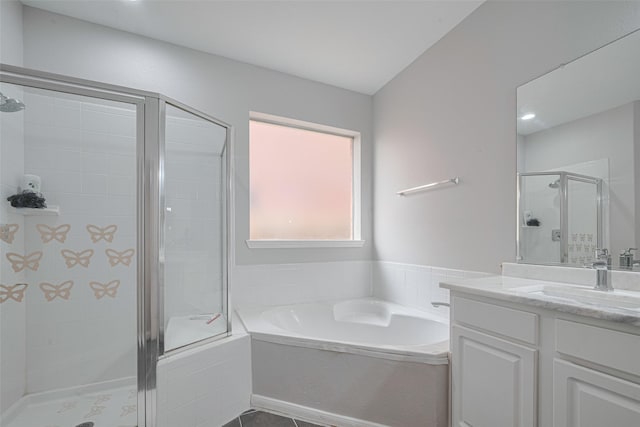7602 Las Flores Dr, Houston, TX 77083 - full bath featuring a garden tub, vanity, a stall shower, and tile patterned flooring