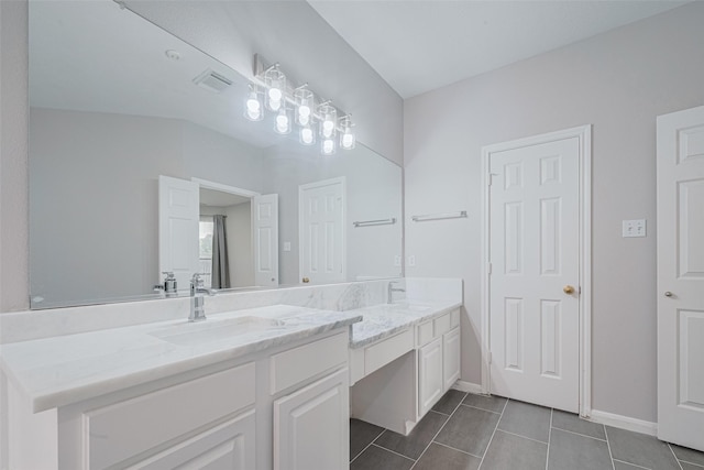 7602 Las Flores Dr, Houston, TX 77083 - full bath with double vanity and tile patterned flooring