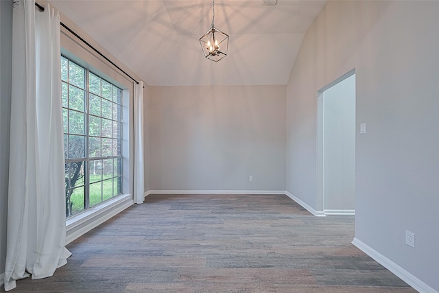 7602 Las Flores Dr, Houston, TX 77083 - unfurnished room with lofted ceiling, a chandelier, and wood finished floors