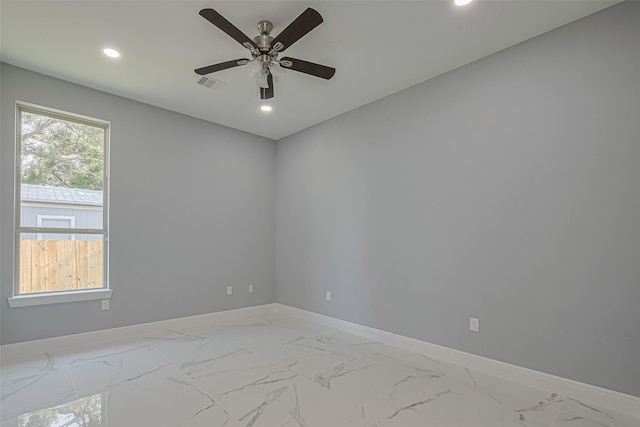 3525 Federal Rd, Pasadena, TX 77504 - spare room with recessed lighting, marble look tiles, and a ceiling fan