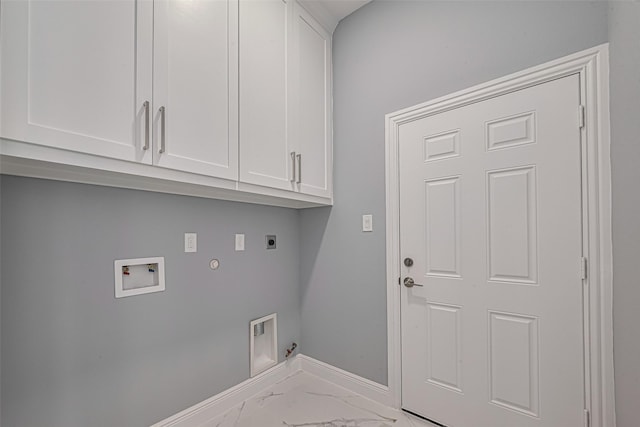 3525 Federal Rd, Pasadena, TX 77504 - laundry room with gas dryer hookup, electric dryer hookup, cabinet space, marble look tile flooring, and washer hookup