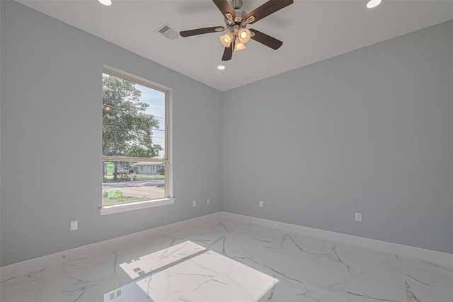 3525 Federal Rd, Pasadena, TX 77504 - empty room featuring recessed lighting, light marble finish flooring, and a ceiling fan