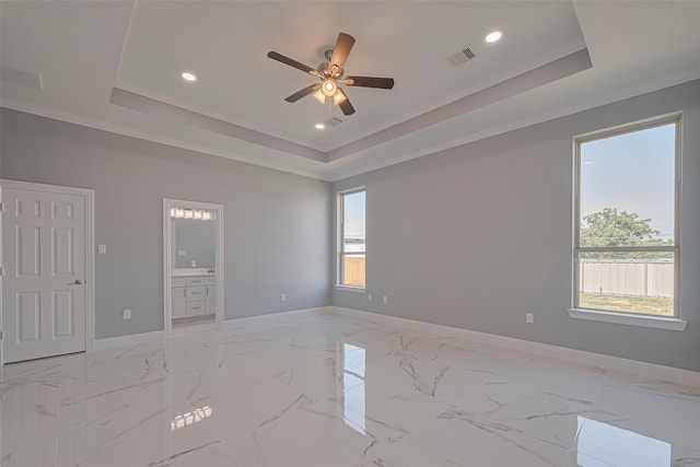 3525 Federal Rd, Pasadena, TX 77504 - spare room with a raised ceiling, ceiling fan, recessed lighting, and light marble finish flooring