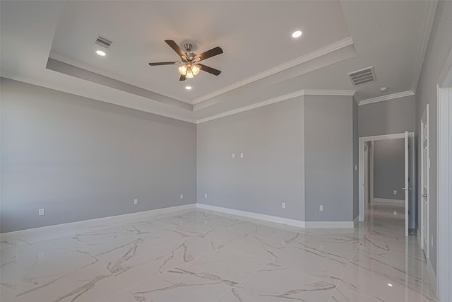 3525 Federal Rd, Pasadena, TX 77504 - empty room with ceiling fan, recessed lighting, a tray ceiling, ornamental molding, and light marble finish flooring