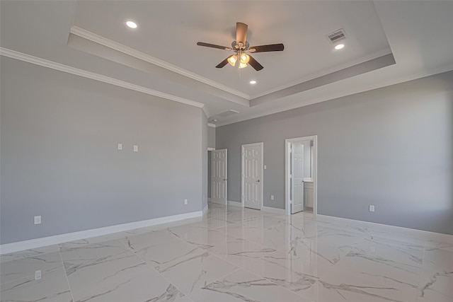 3525 Federal Rd, Pasadena, TX 77504 - spare room featuring a tray ceiling, a ceiling fan, recessed lighting, crown molding, and light marble finish flooring