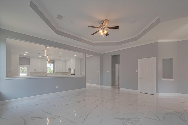 3525 Federal Rd, Pasadena, TX 77504 - empty room with ceiling fan, a raised ceiling, recessed lighting, and ornamental molding