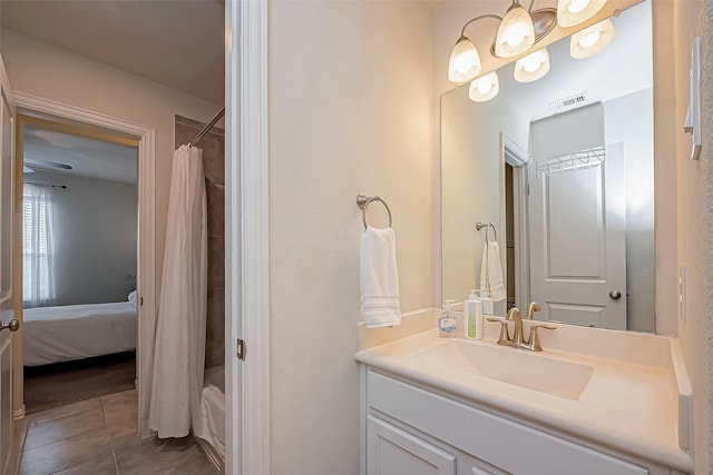 2226 Blakely Grove Ln, Richmond, TX 77469 - bathroom featuring vanity, tile patterned flooring, shower / tub combo with curtain, and connected bathroom
